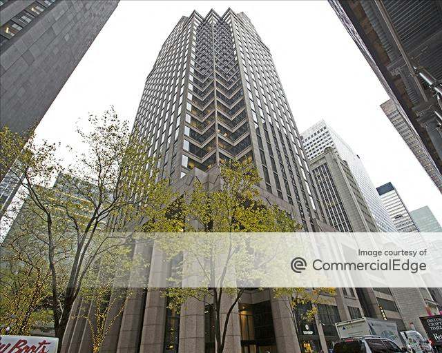 view from street level looking up at the manhattan office tower at 31 West 52nd Street