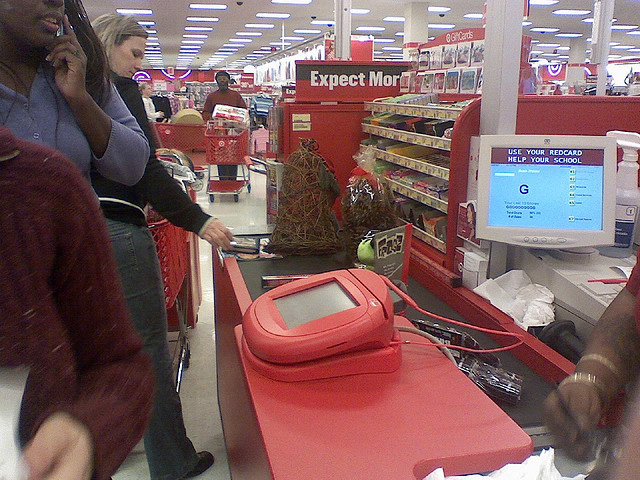 121411-EconWatch-Checkout-Line-user-The-Consumerist-300x225