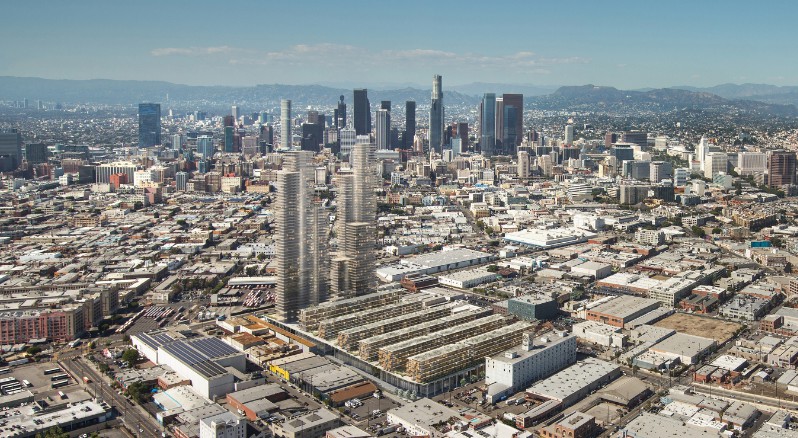 This artist's rendering depicts SunCal's proposed 6AM mixed-use development in the Los Angeles Arts District.  The City's downtown skyline appears in the background. (PRNewsFoto/SunCal)