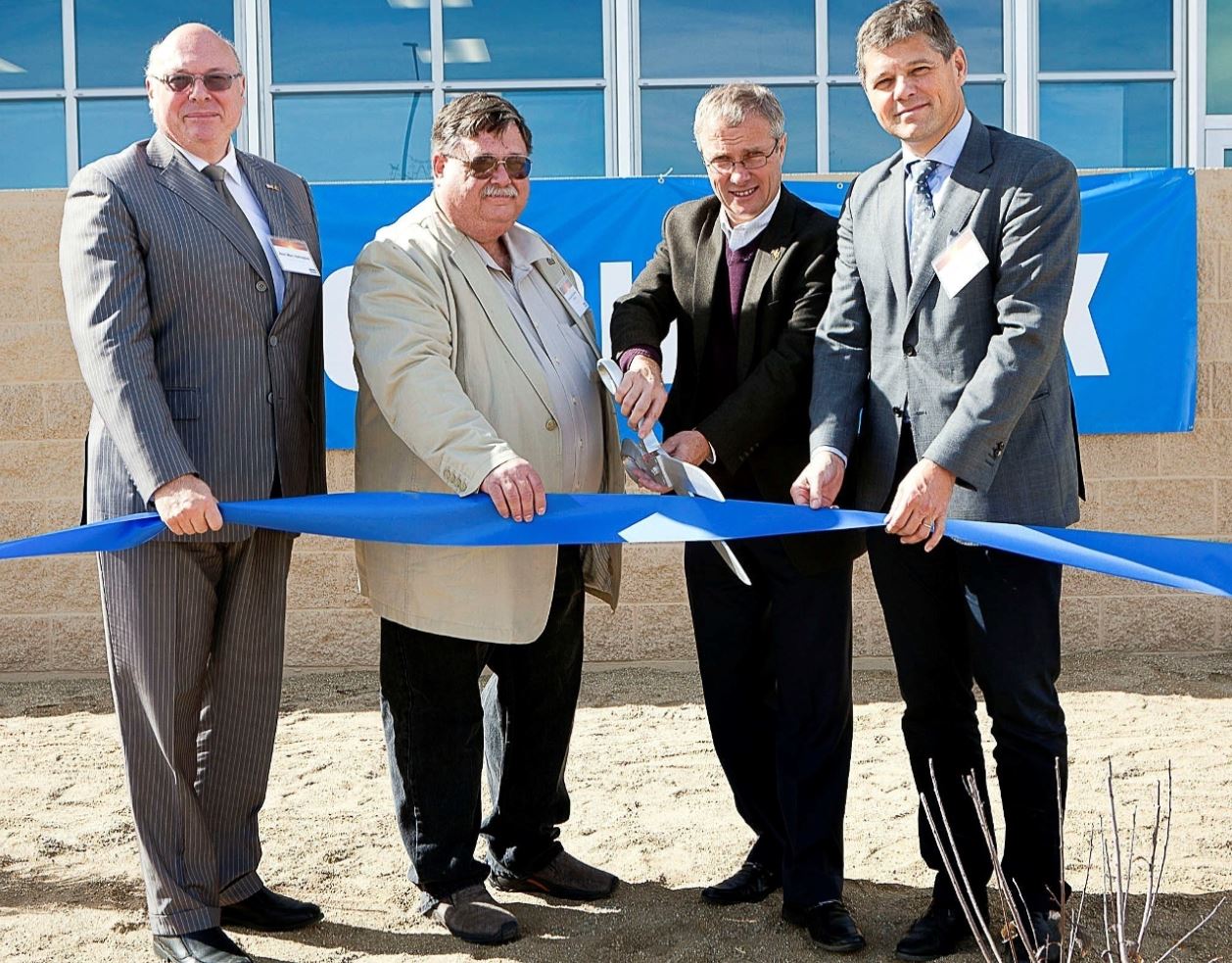 From left to right: Henri Vantieghem, Consul General of Belgium in Los Angeles; Roy Edgington Jr., Mayor, Fernley, Nevada; Filip Geeraert, president and CEO, Deceuninck North America; Francis Van Eeckhout, CEO, Deceuninck Group