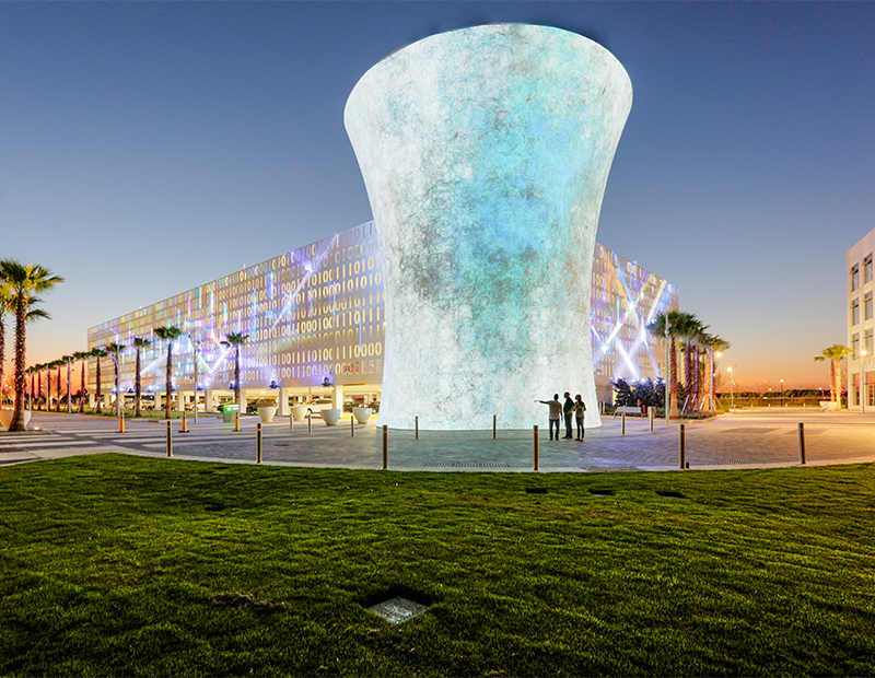 In a characteristic New Urbanism strategy, the Beacon and Code Wall at Lake Nona Town Center in Orlando disguise a parking garage. Lake Nona draws on New Urbanism strategies throughout its 17-square-mile footprint.