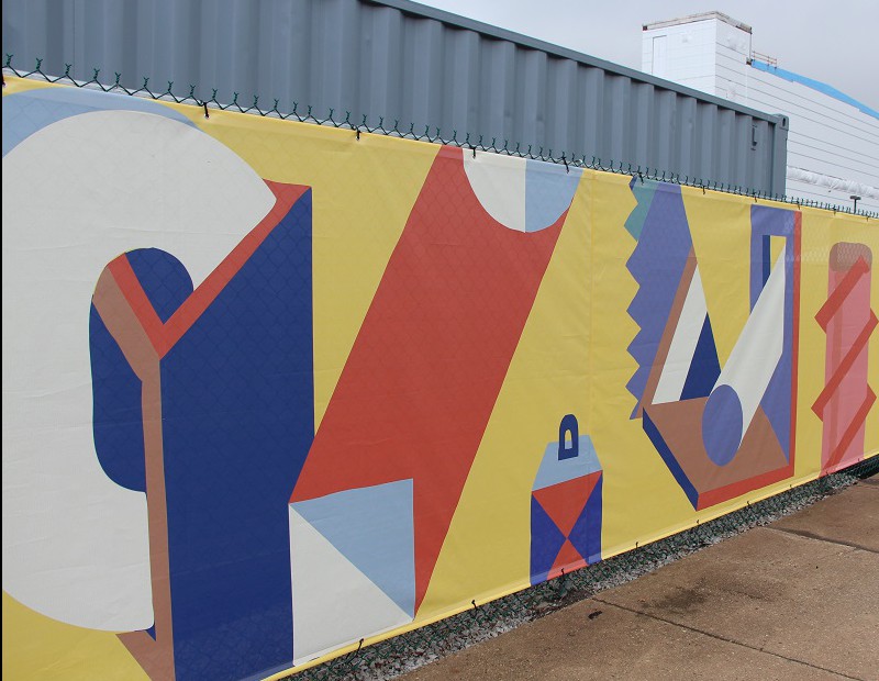 A colorful installation by the Philadelphia artist Nate Harris adorns the fence surrounding the Navy Yards new peaking plant.