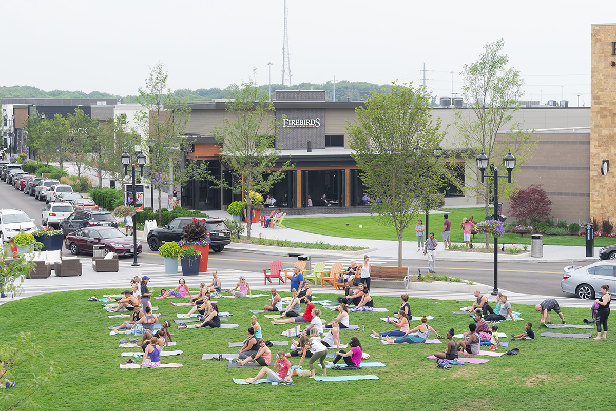 Taking fitness outside. One of the tenants at Pinecrest in Ohio is organizing open air yoga events to engage its customers. Image courtesy of Pinecrest.
