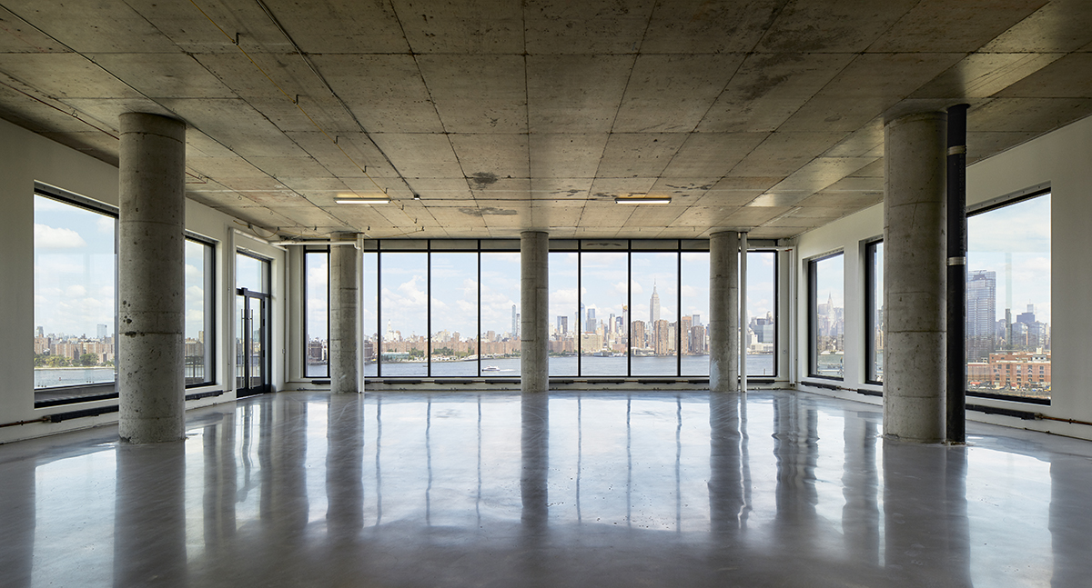 Designed by Hollwich Kushner with Gensler as the design development architect, Brooklyn’s 25 Kent features half a million square feet of office space across an entire city block. Developers Rubenstein Partners and Heritage Equity Partners intend to fill the waterfront building with creative-driven tenants. Image by Ty Cole