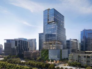 Exterior rendering of Parkside Uptown, a 30-story office building with glass facade, surrounded by multiple mid-rise office properties