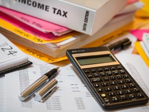 Tax books and calculator