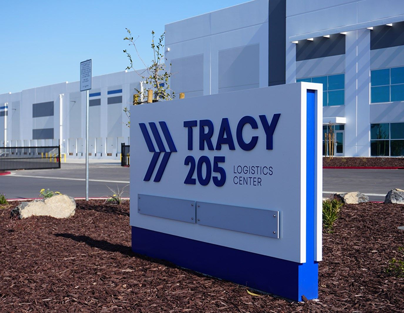 Exterior shot of the entrance sign at Tracy 205
