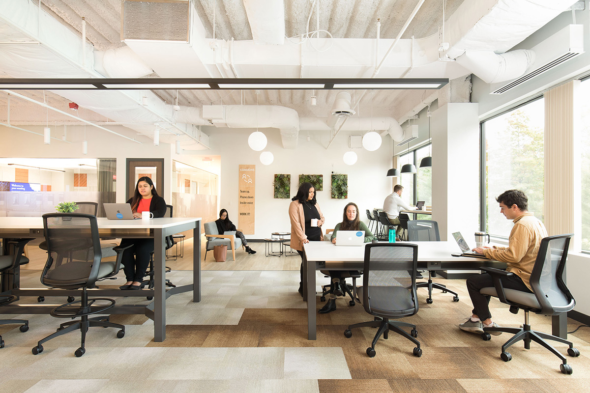 Workbar has several locations in the Boston area, including in Woburn, Mass. Collaborative spaces are key to the design of the company’s coworking properties. 
Image courtesy of Workbar