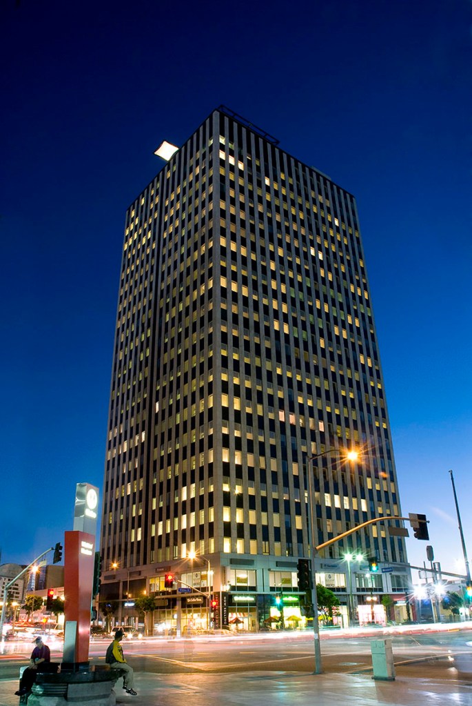 The former Getty Oil Co. headquarters in L.A.’s Koreatown was transformed into 238 condominiums. Amenities include a rooftop pool, gym and lawn. Image courtesy of TCA Architects