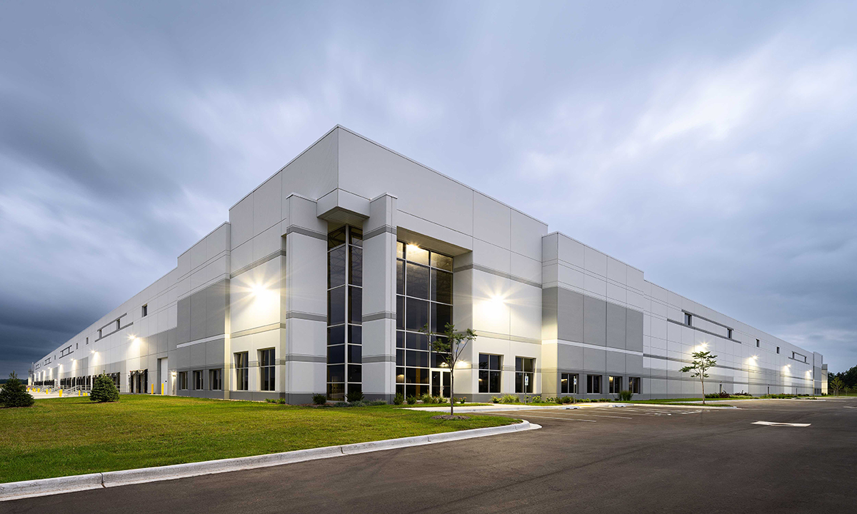 An exterior shot of Bristol Highlands Commerce Center West, one of three buildings in a 1 million-square-foot industrial park located in Bristol, Wis. The facility, a storage warehouse by confectionary company HARIBO, lies less than two miles of the manufacturer’s first factory in North America. Image courtesy of Premier Design + Build Group.