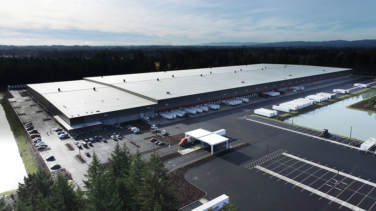 Cubes at Tumwater, a 1.1 million-square-foot distribution center in Tumwater, Wash. CRG developed the facility as a speculative project, eventually designing it to accommodate Costco. The site was chosen in part due to its ability to expand to accommodate more space if needed, as well as its sustainable technological fit outs. The site incudes a stormwater collection system that prevents flooding, as well as a portion of its parking lot that can be quickly converted to a solar farm. Image courtesy of CRG.