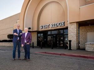 Advisors Excel Co-Founders Cody Foster and David Callahan outside West Ridge Mall in Topeka, Kan. 