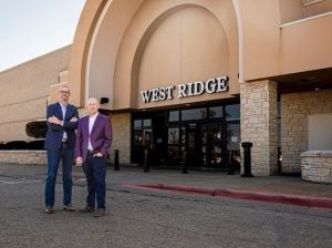 Advisors Excel Co-Founders Cody Foster and David Callahan outside West Ridge Mall in Topeka, Kan.