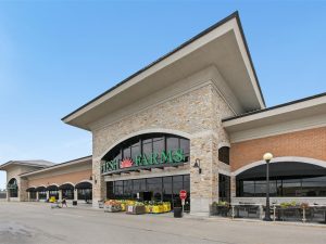 Completed in 1975, the grocery-anchored shopping center comprises four, one-story buildings. Image courtesy of Mid-America Real Estate Corp.