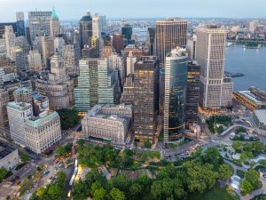 Aerial shot of One Battery Park Plaza, a 870,000-square-foot, 35-story office tower in Lower Manhattan, overlooking The Battery Park.