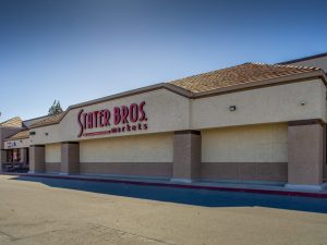 Exterior shot of Grand Covina Plaza, a 111,975-square-foot, grocery-anchored retail center in Covina, Calif.