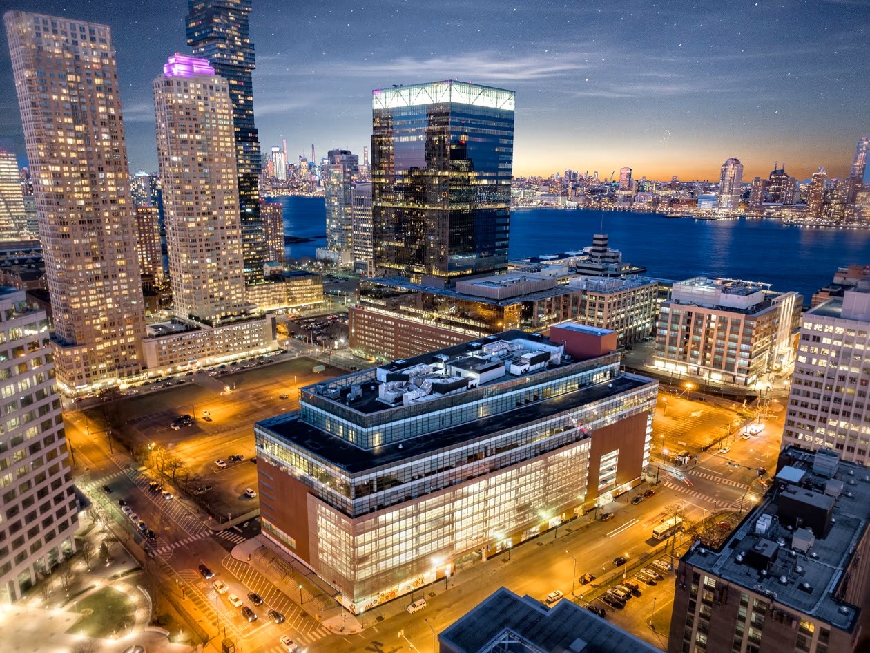 Aerial evening view of Harborside 6 in Jersey City, N.J.