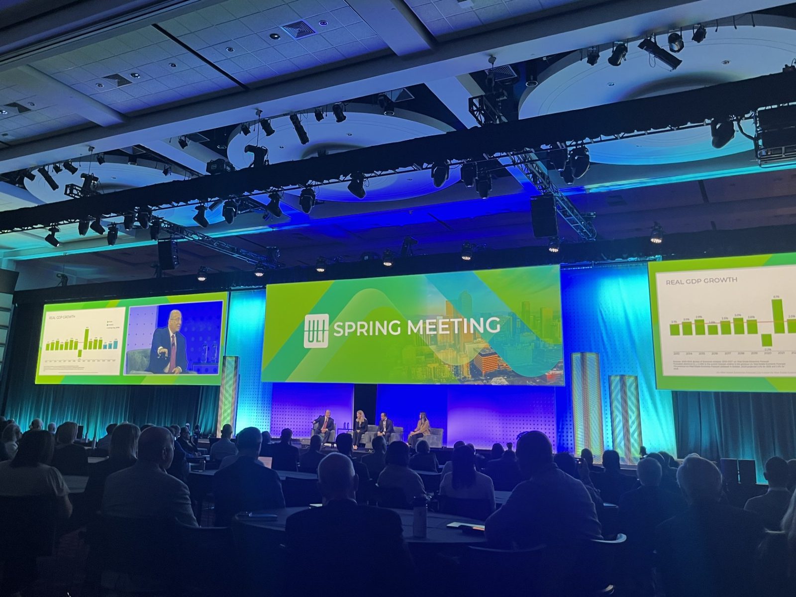 A photo of a discussion of sector predictions between CNBC's Ron Isana, Suzanne Mulvee of GID, Indy Karlekar of Clarion Partners and Heitman's Emi Adachi. =