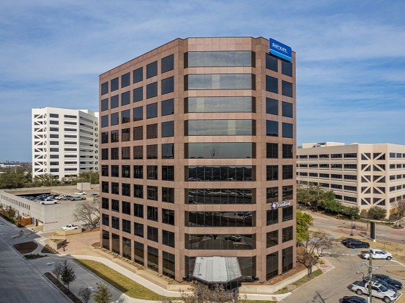 Exterior shot of The Crossing I, an office building in Dallas.