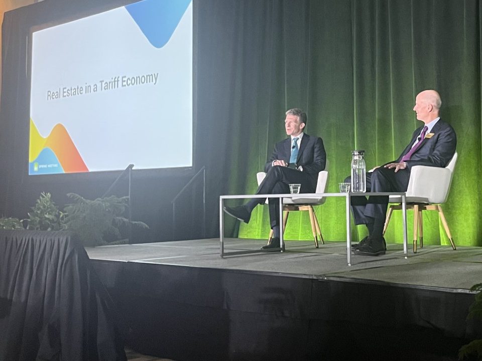 A photo of Willy Walker in conversation with BXP CEO Owen Thomas.