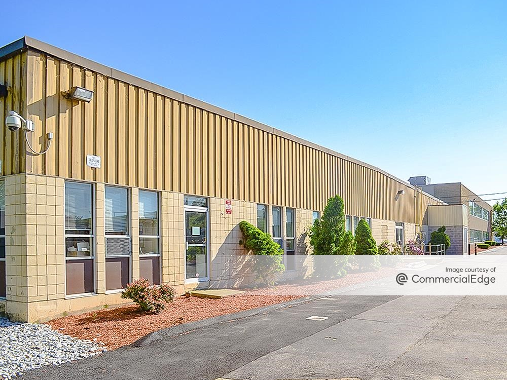 Exterior shot of the property at 120 Stedman St. in Lowell, Mass.
