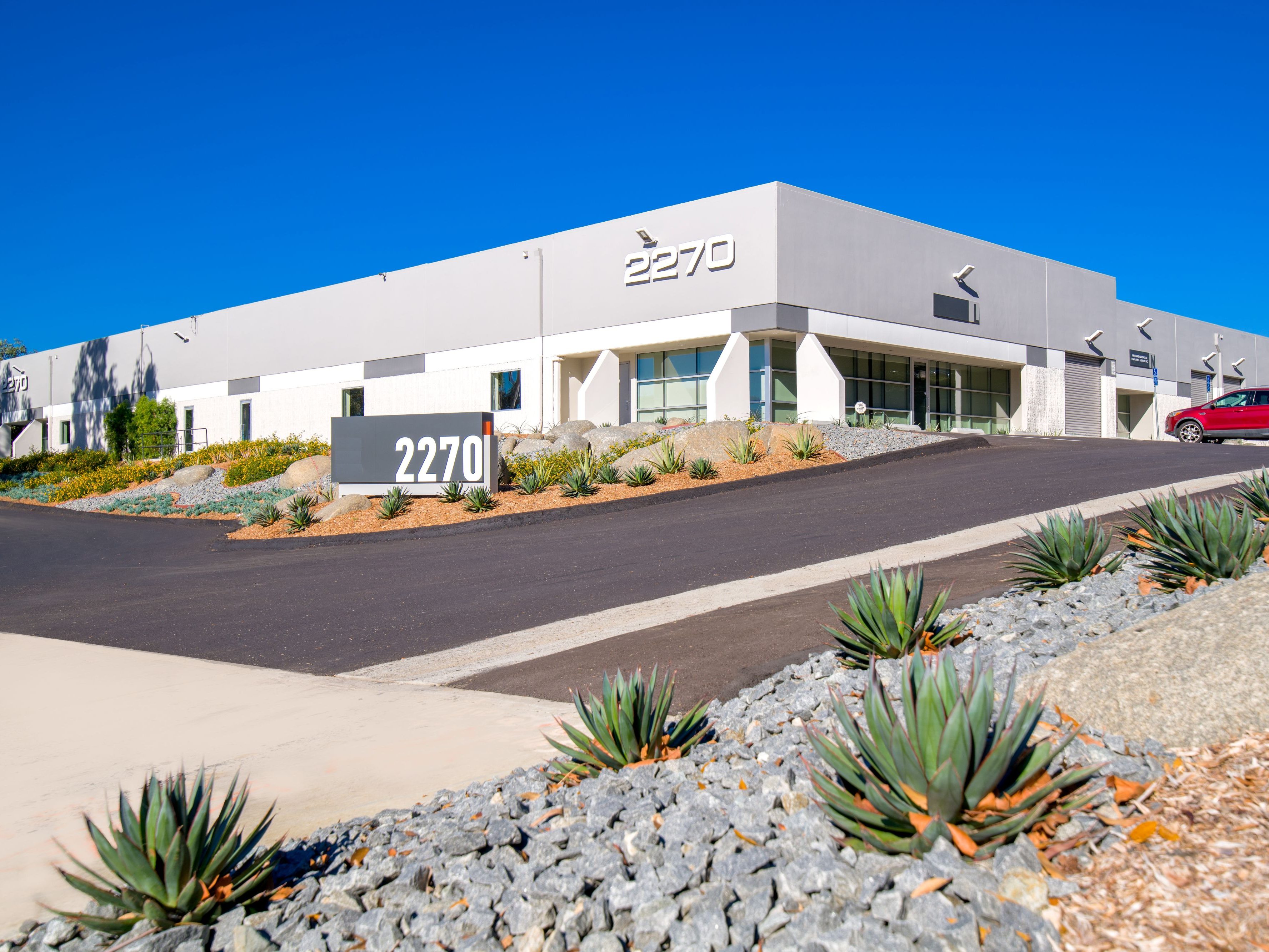 Exterior shot of the industrial facility at 2270 Camino Vida Roble in Carlsbad, Calif.