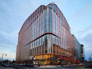 Modern mid-rise office building at dusk