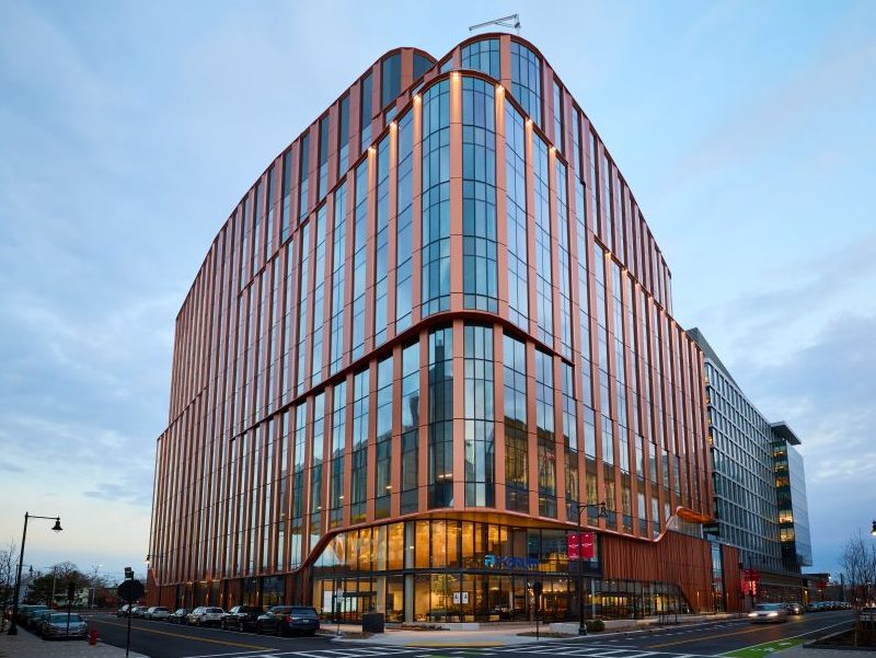 Modern mid-rise office building at dusk