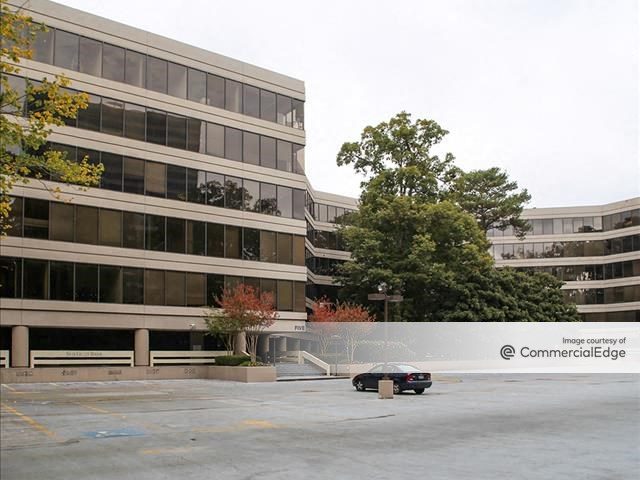 Exterior shot of a multi-story office building, part of Piedmont Center campus