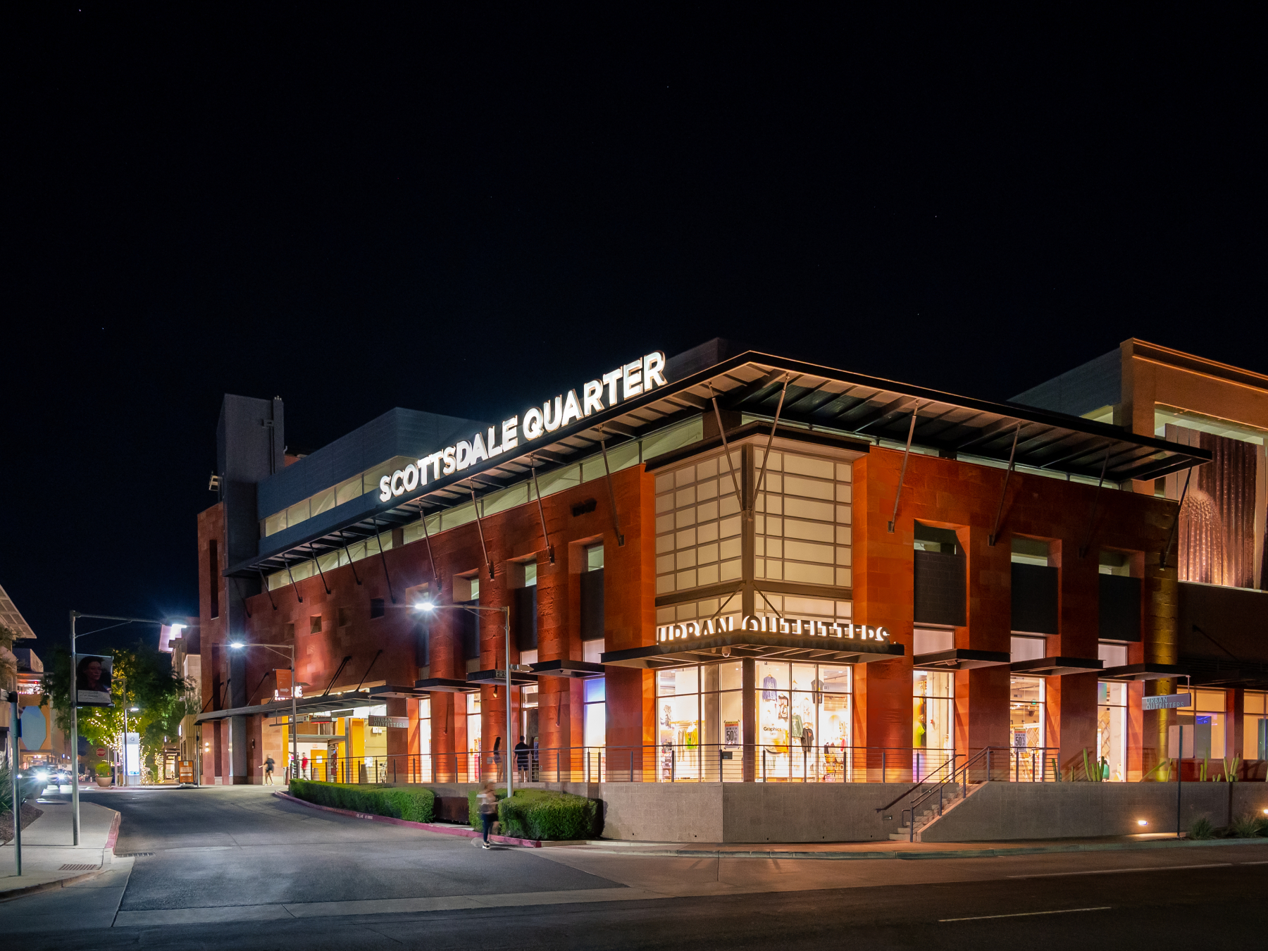 Nighttime shot of the mixed-use Scottsdale Quarter's exterior.