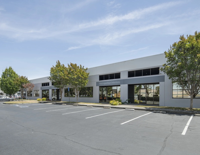 Exterior shot of one of the three buildings that make up Hesperian Business Park in Hayward, Calif., an industrial campus acquired by BKM Capital and Kayne Anderson from Link Logistics.