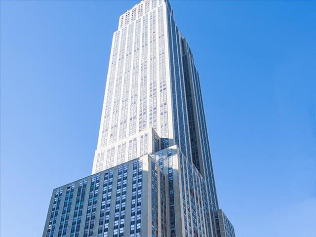 Exterior shot of Empire State Building, an office tower in Manhattan.