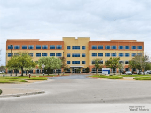 Exterior shot of The Physician Centre, a medical outpatient facility in Bryan, Texas.