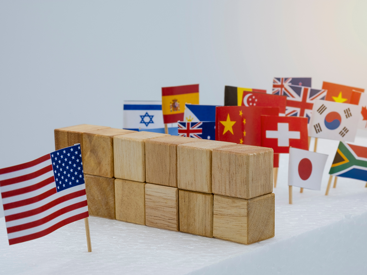 USA China and multi countries flags with wooden fence. It is symbol of America first policy and tariff trade war.-Image.