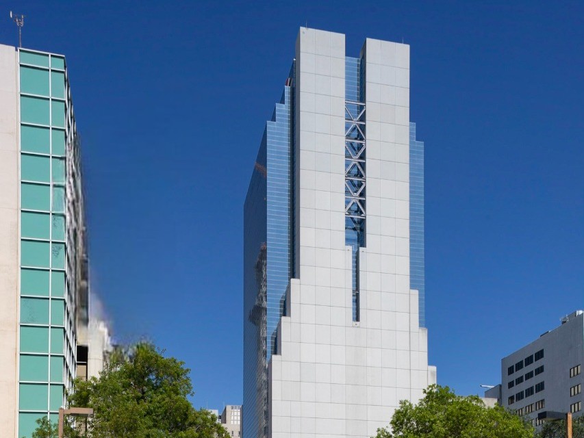 Exterior shot of the top section of Museum Tower in Miami