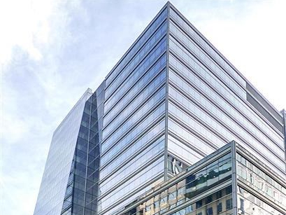 Exterior shot depicting one of the two life sciences buildings that serve as headquarters of Vertex Pharmaceuticals in Boston.