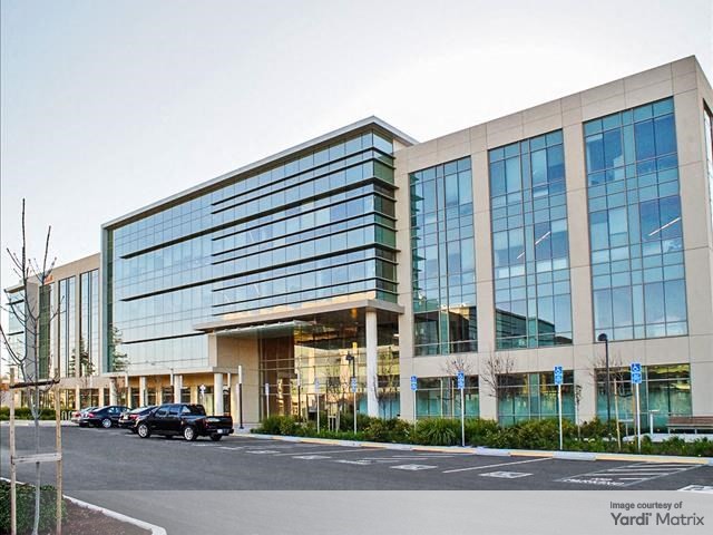 Exterior shot of Building A at The Camps at Scott, an office building in Santa Clara, Calif.