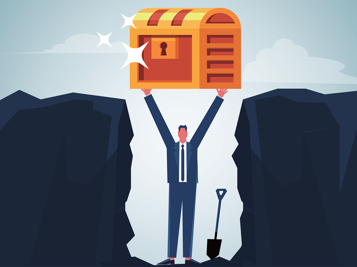 The businessman unearths a treasure chest in a rock