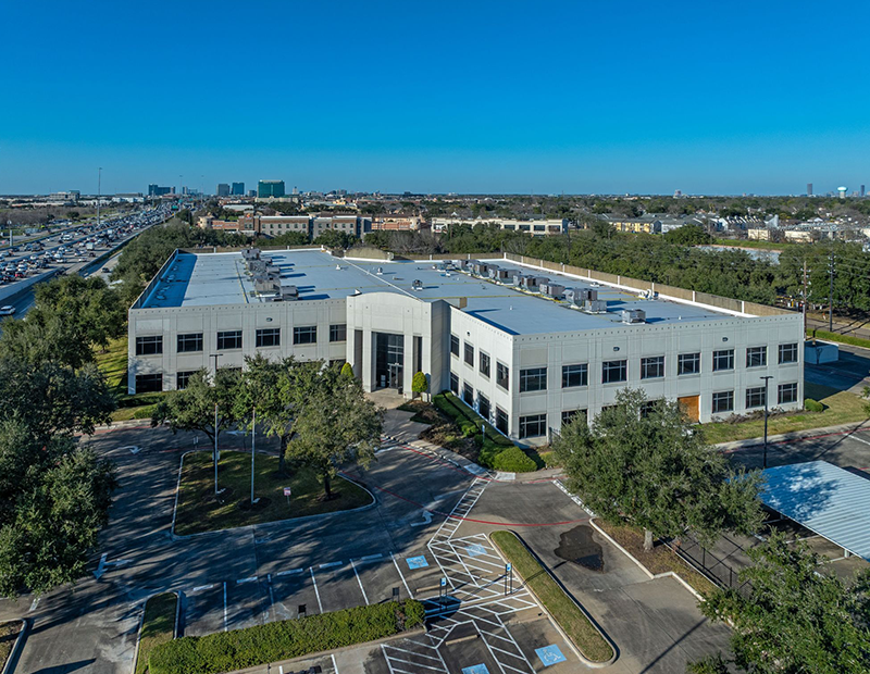 Aerial photo of the 8101 W Sam Houston Parkway South, an office building in Houston.