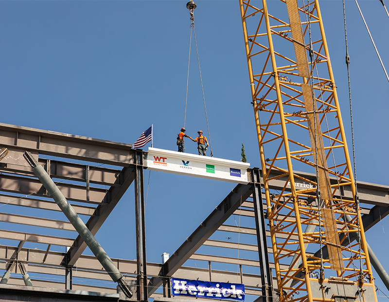 Construction workers topping out LAX01 a data center in Vernon, Calif.