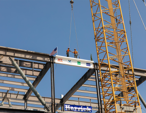 Construction workers topping out LAX01 a data center in Vernon, Calif.