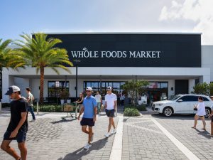 Exterior shot of Whole Foods Market within the Uptown Boca shopping center