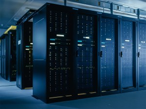 Shot of Data Center With Multiple Rows of Fully Operational Server Racks. Modern Telecommunications, Cloud Computing, Artificial Intelligence, Database, Super Computer Technology Concept.