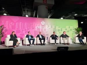 A photo of the panel on sustainability at CRETech New York.