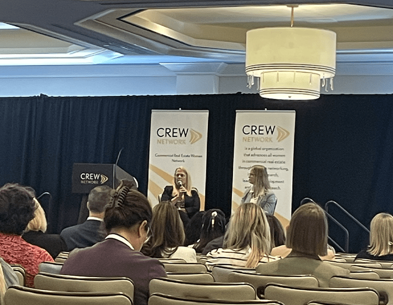 Speakers Nancy Novak and Kathleen Kauth on their discuss of data center development at CREW Network conference in Austin, Texas.