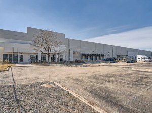 Exterior shot depicting one of the 16 warehouses acquired by Harrison Properties in Denver.