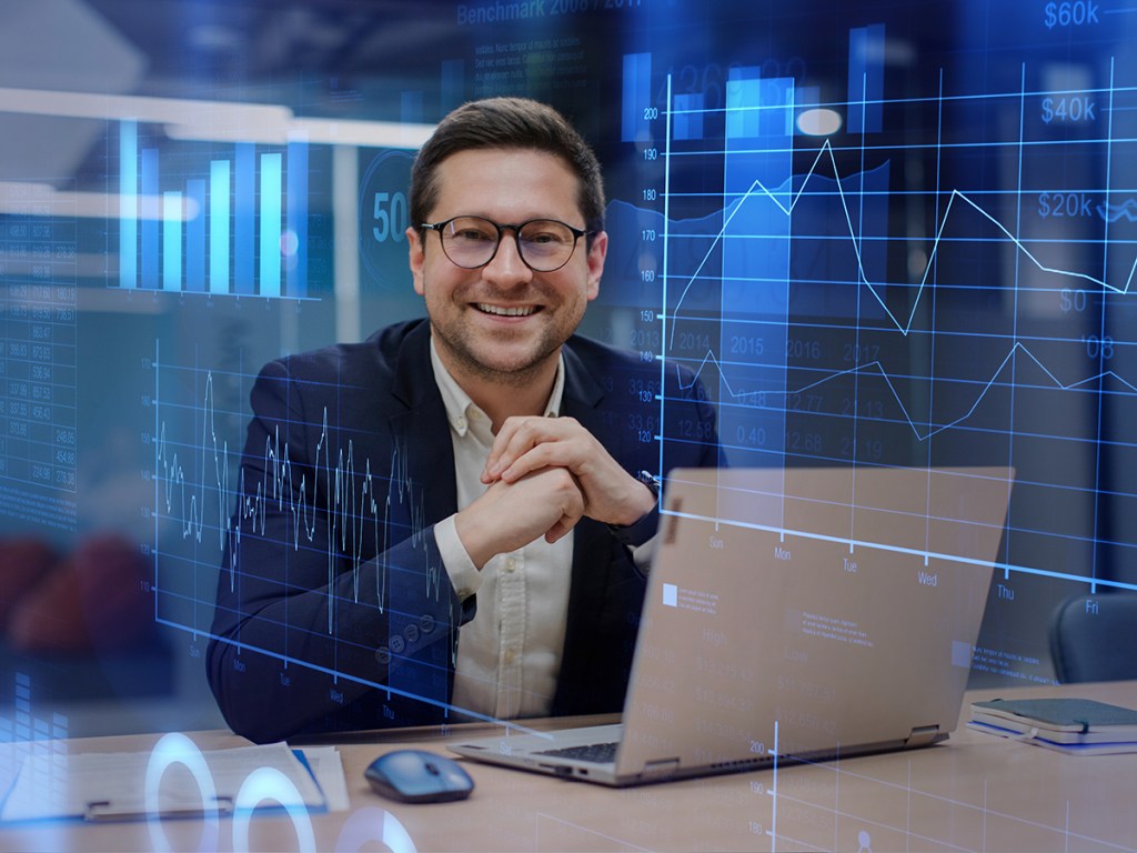 Confident man at his laptop