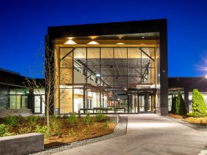 Nighttime exterior shot of The Stitch, a 250,000-square-foot office building in Morrisville, N.C.