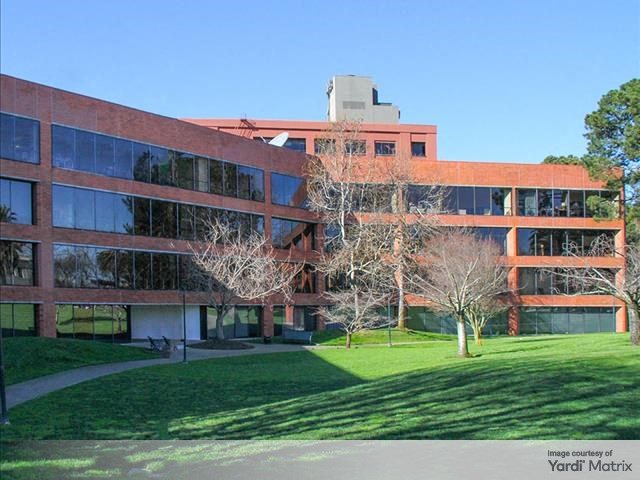 Exterior shot of one of the office buildings at Waterfront Plaza, an office campus in San Francisco.
