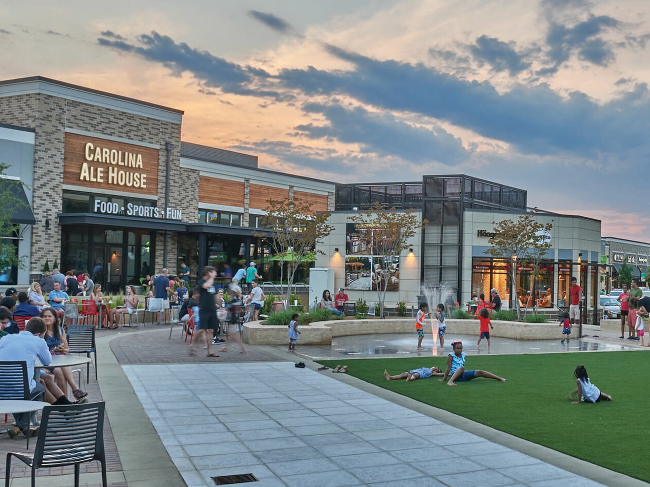 Exterior shot depicting Waverly Mall in Charlotte, N.C., a retail property owned by Childress Klein and Ascentris.